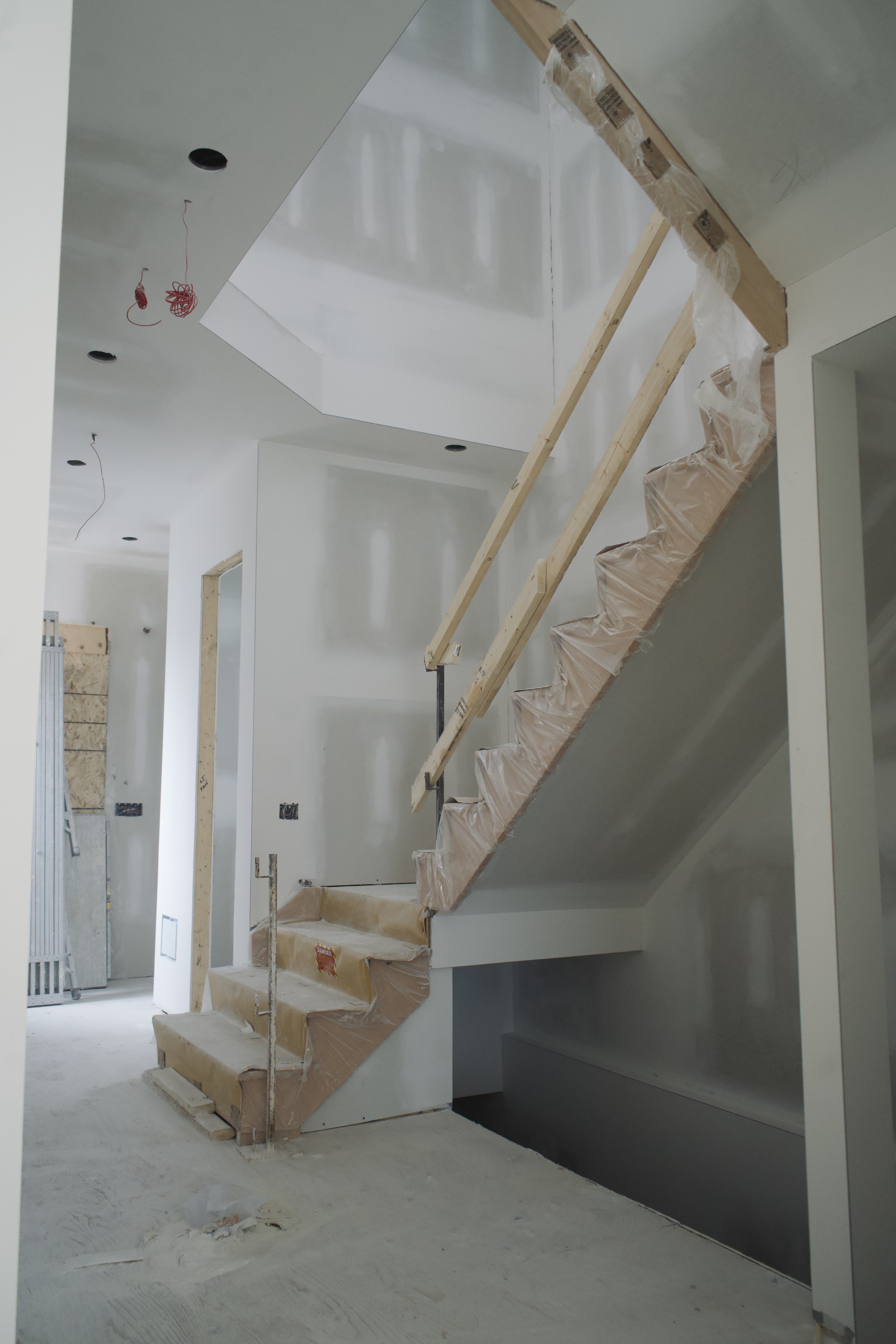 After — finished drywall & paint-ready walls